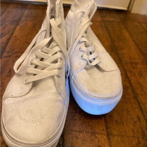 White platform high top vans